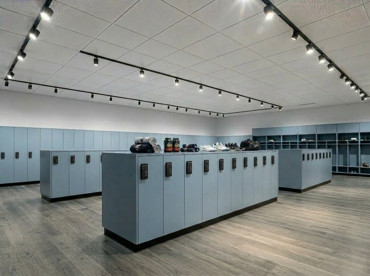 Sports facility locker room with island-style grey wood lockers